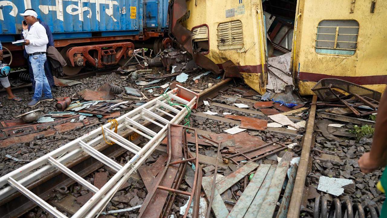 Remains of coaches after a collision between the Kanchanjungha Express and a goods train, near Rangapani railway station