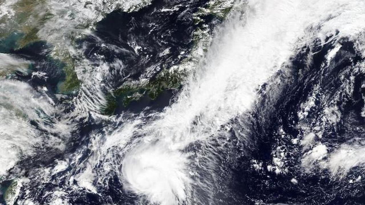 Storm heading northward toward Japan packing winds, downpour