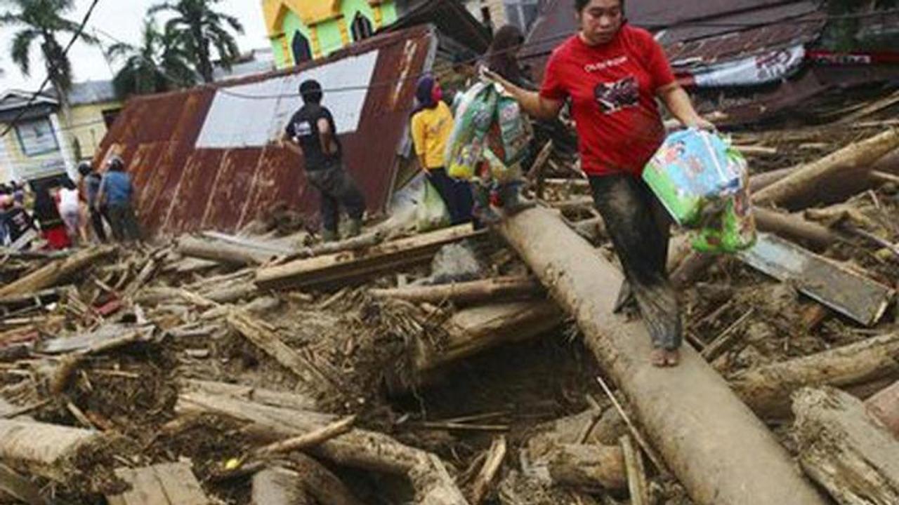 At least 21 killed in flash floods South Sulawesi province