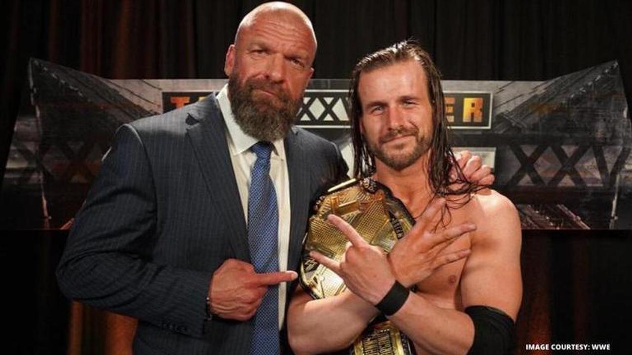 Triple H and Adam Cole