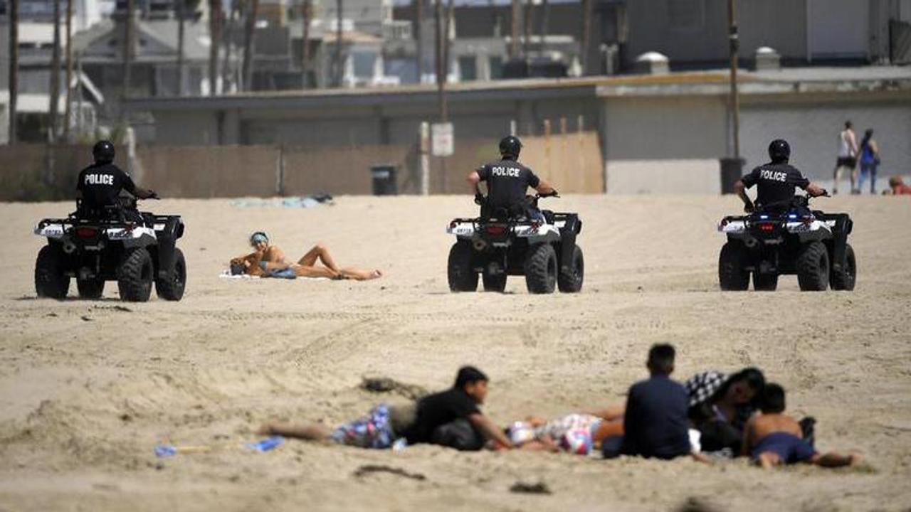 US: California beaches reopen after weekend virus closure