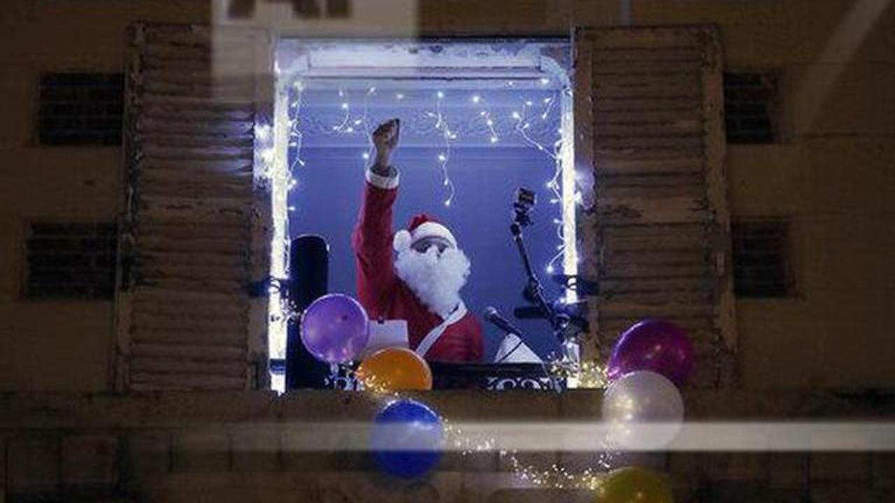 Senechal sings Xmas songs as Paris observes curfew