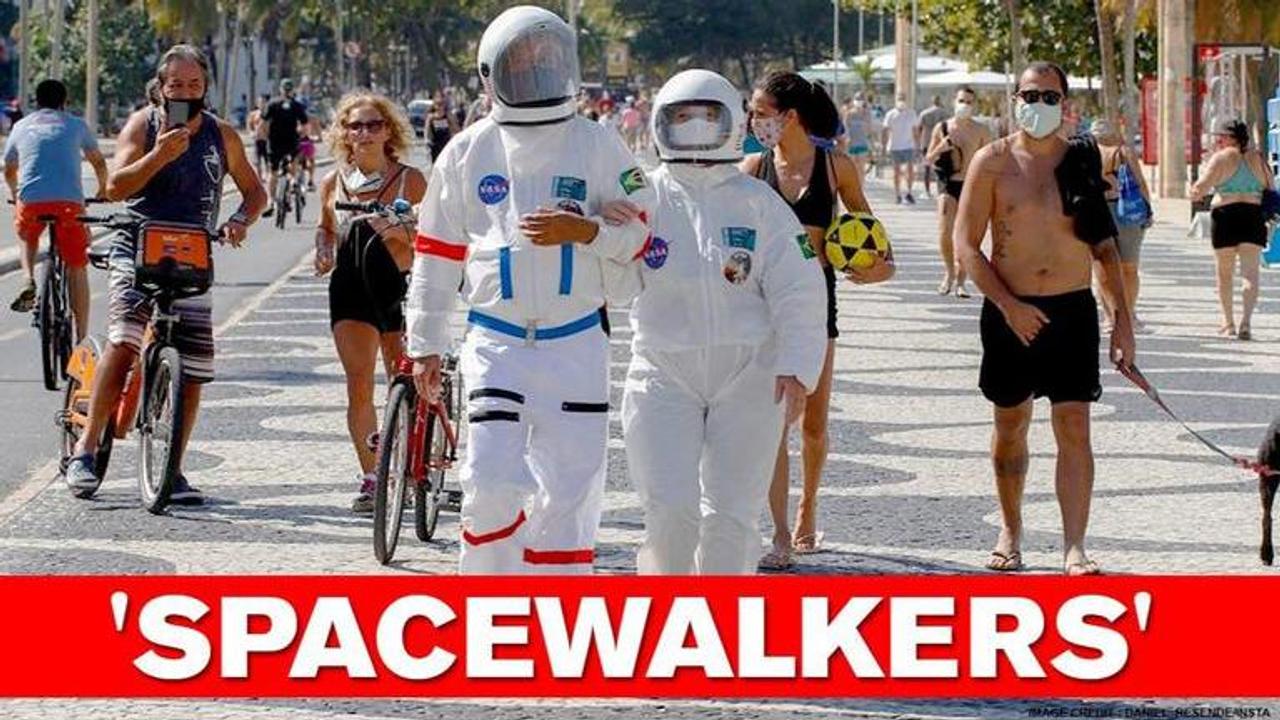 Spacewalk enthusiast couple walk the streets of Brazil