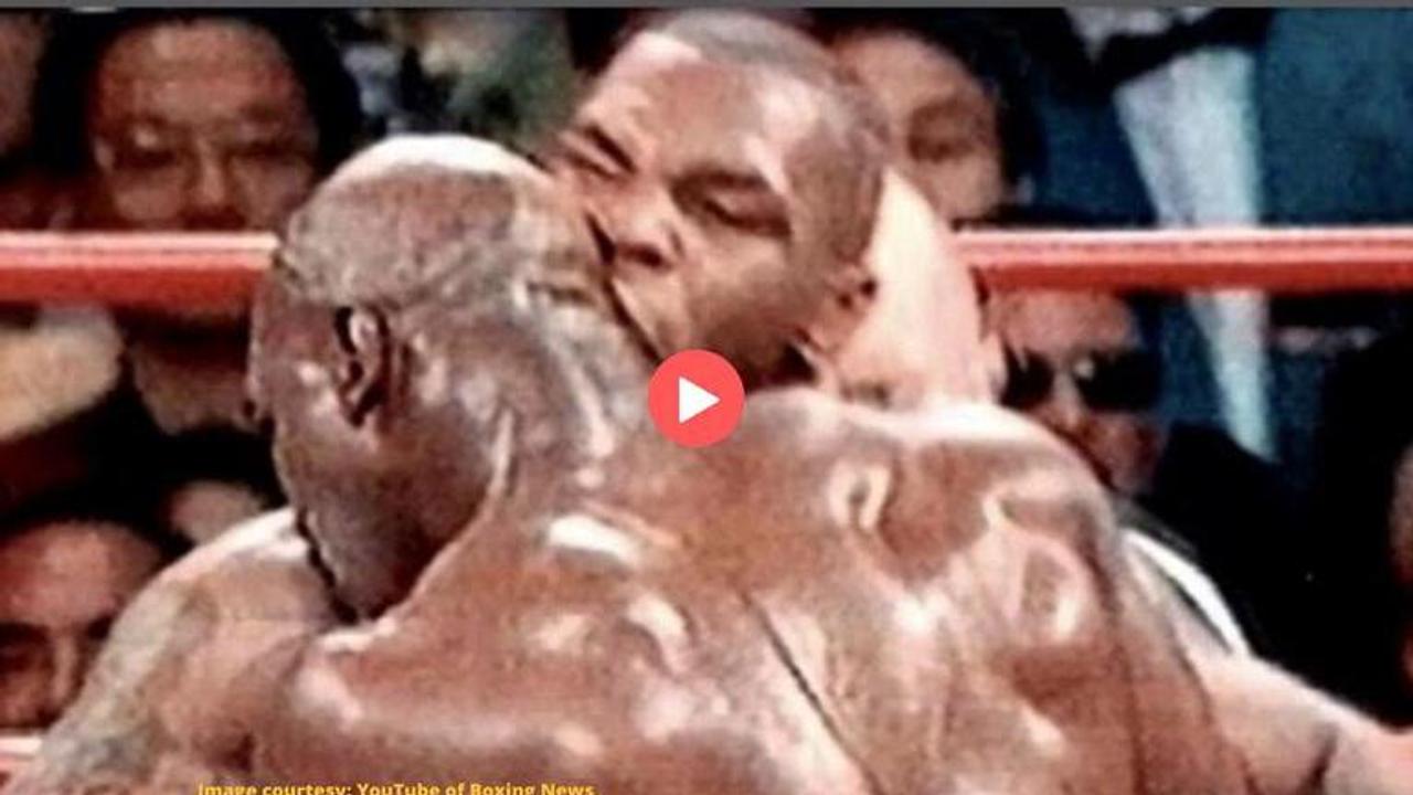 whose ear did mike tyson bite off in 1997