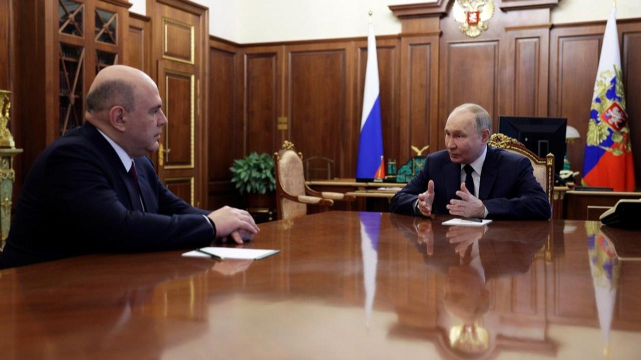 Russian President Vladimir Putin, right, speaks to Mikhail Mishustin, the candidate for the post of Russian Prime Minister during their meeting at the Kremlin