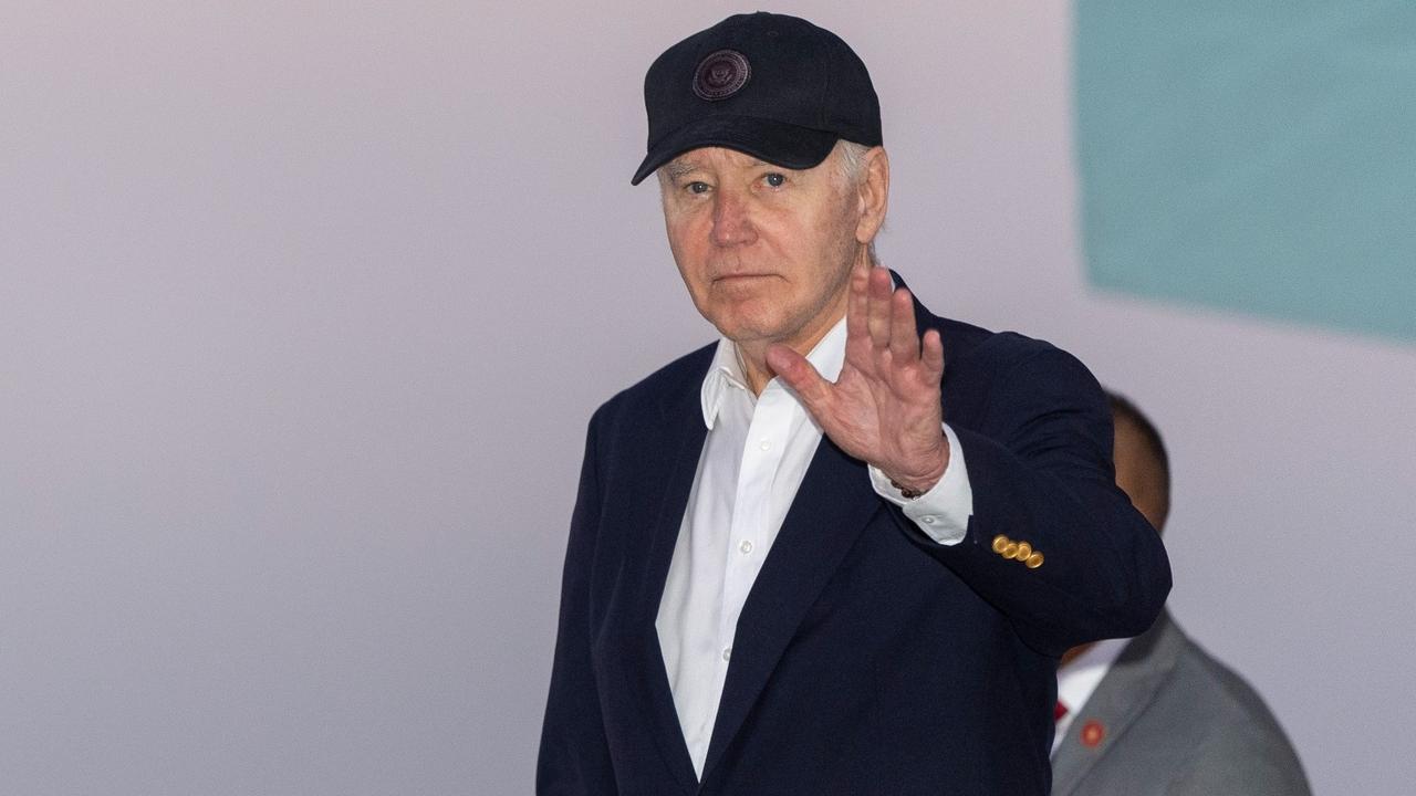 President Joe Biden waves as he arrives on Air Force One, Saturday, June 15, 2024, in Los Angeles. Biden will attend a campaign event.