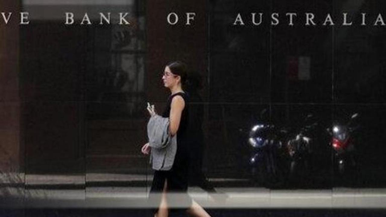 Australia cuts benchmark interest rate to record low 0.25%