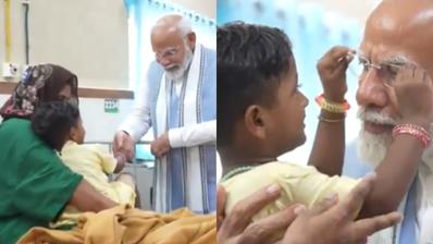 Child Plays With PM Modi’s Beard As He Visits Victims Of Wayanad Tragedy