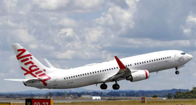 Man Arrested For Running Naked Through Virgin Australia Airplane, Knocking Down Flight Attendant