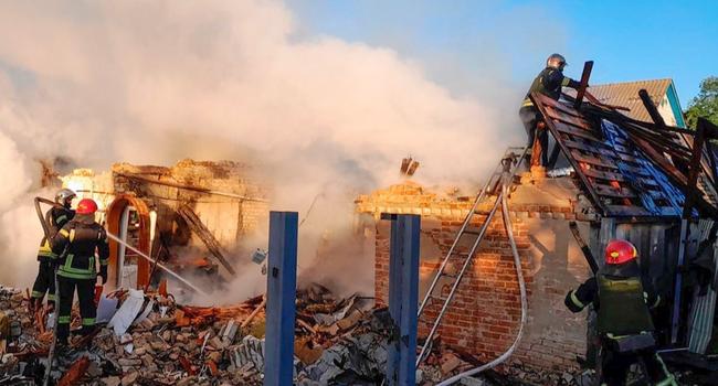 Ukrainian emergency services responding to the aftermath of the Russian attack.