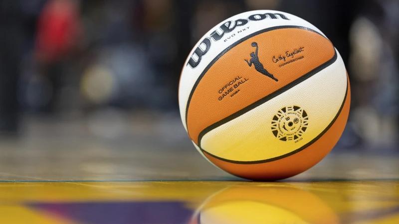 A WNBA basketball sits on the court during a WNBA game