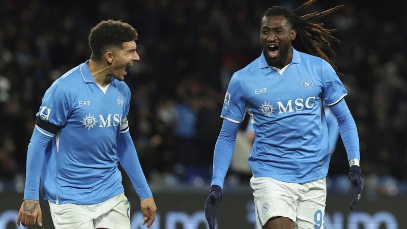 Andre-Frank Zambo Anguissa, right, celebrates after scoring his team’s second goal, with Napoli’s Giovanni Di Lorenzo