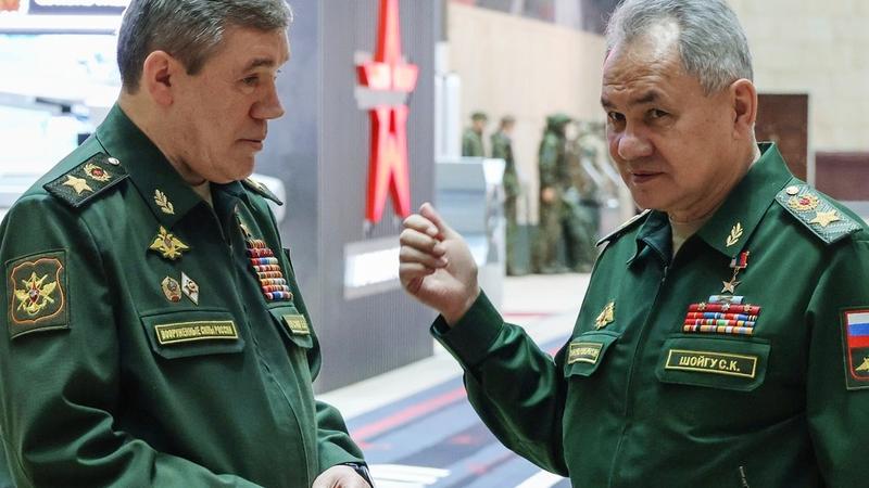 Sergei Shoigu, right, gestures as he speaks to Russian Chief of General Staff Gen. Valery Gerasimov 