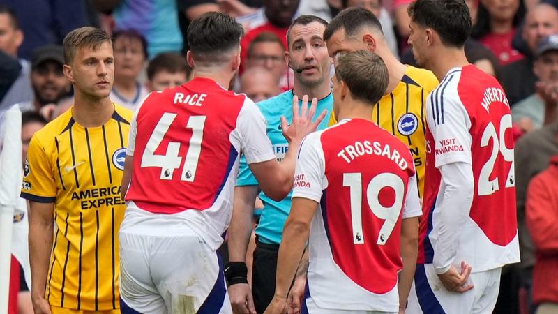 Arsenla players contest Declan Rice red card