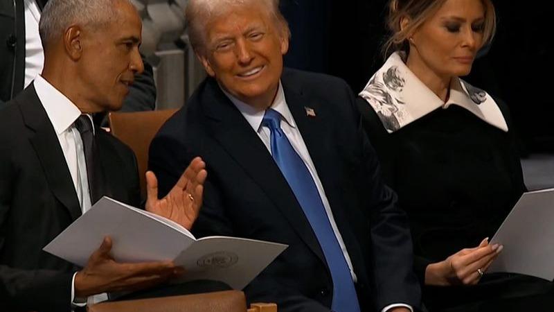 Barrack Obama and Donald Trump at Jimmy Carter's funeral.