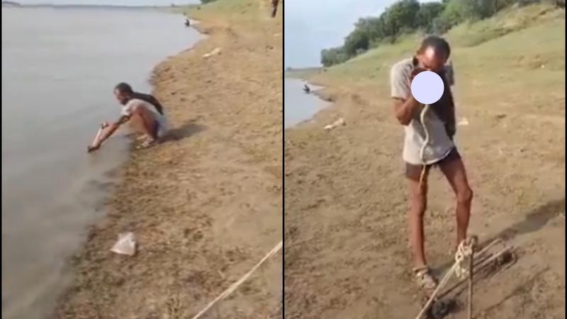 Bizarre Video Shows UP Man Eating Live Snake Straight From the River