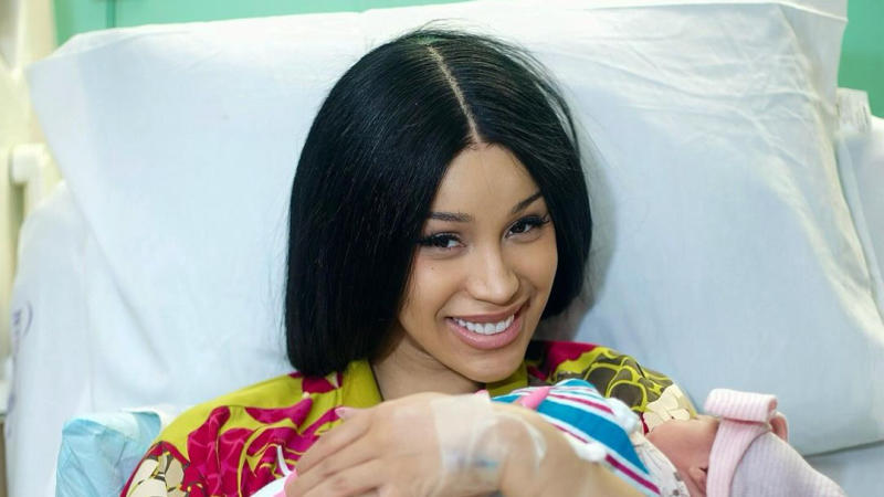 Cardi B holding her newborn.