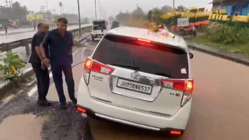 Chouhan's car today got stuck in a muddy pothole amid rains 