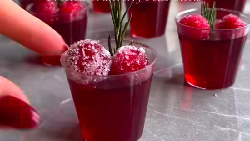 Cranberry Ice Cube Mimosas is the bubbly drink to serve at a Christmas Bash this year. 