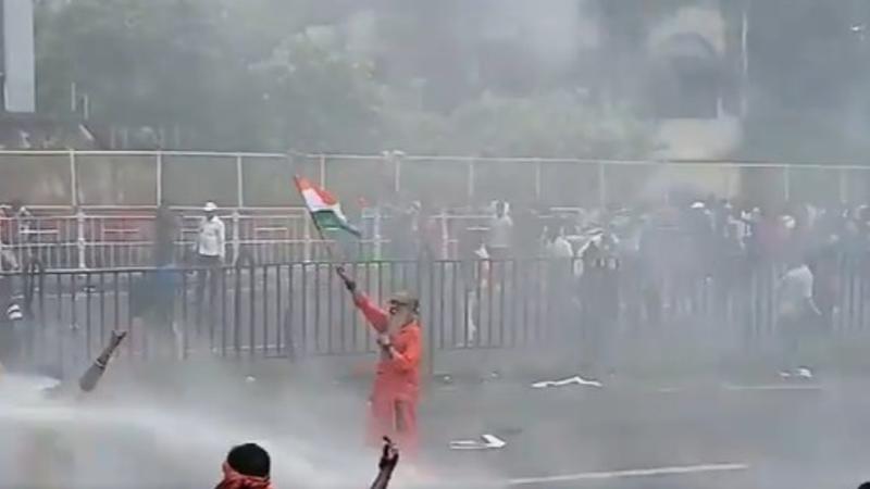 Defiant Display: Nabanna Protester Waves Indian Flag Against Cops' Brutality