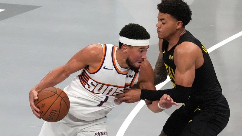 Devin Booker in action for Phoenix Suns vs Utah Jazz