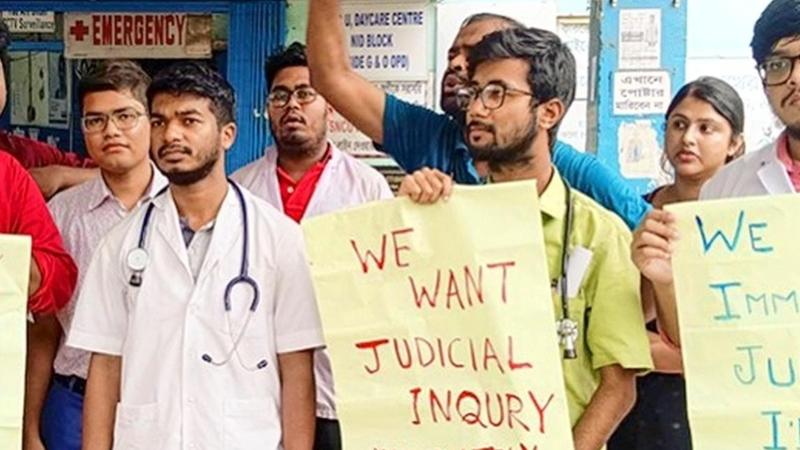 Doctors wearing black armbands raised slogans calling for justice for the victim. 