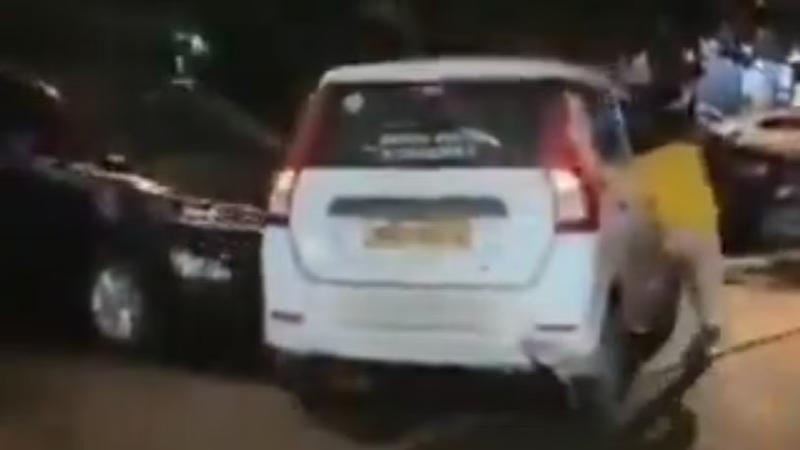 Drunk Man Performing stunts in car held