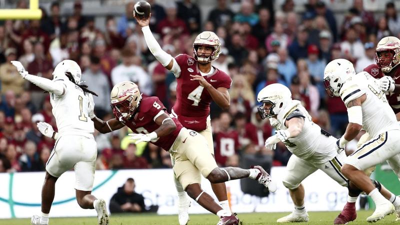 Florida State's player throws the ball