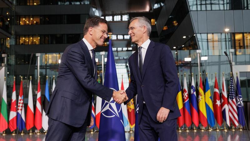 Former Dutch PM Mark Rutte (L) appointed as NATO secretary general