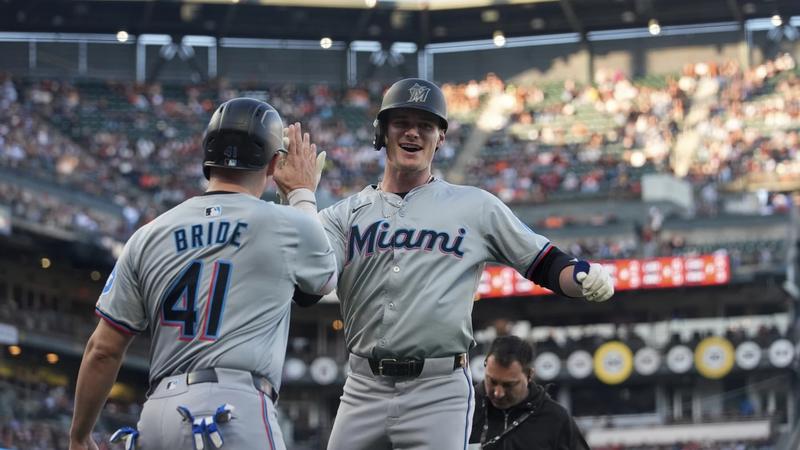 Griffin Conine celebrates