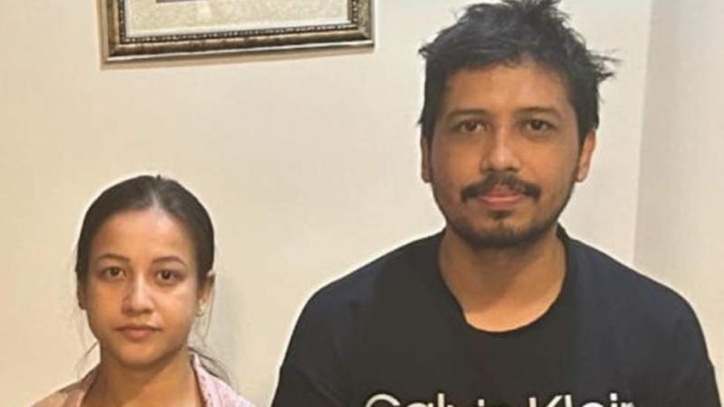 Sumi Borah, along with her husband Tarkik Borah, have surrendered to the police in connection with the Rs 2,200-crore stock trading scam in Assam