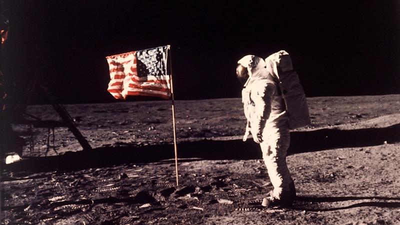 In this photo provided by NASA, astronaut Edwin "Buzz" Aldrin poses for a photograph beside the U.S. flag deployed on the moon during the Apollo 11 mission on July 20, 1969.