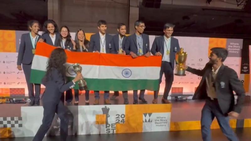 Indian Chess Grandmasters celebrate their win at the Chess Olympiad