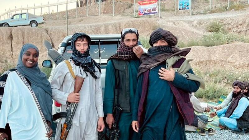 Influencer poses with Taliban