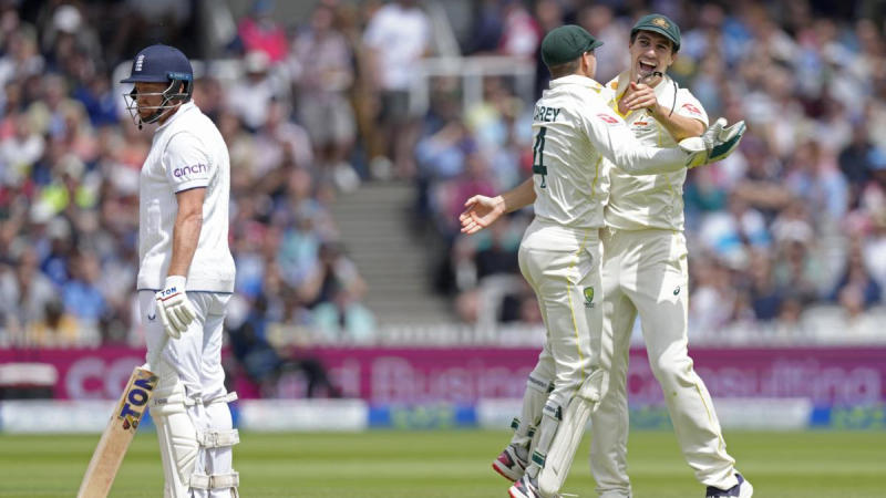 Jonny Bairstow looks as Alex Carey and Pat Cummins celebrate the fall of his wicket during Ashes 2023 at Lord's