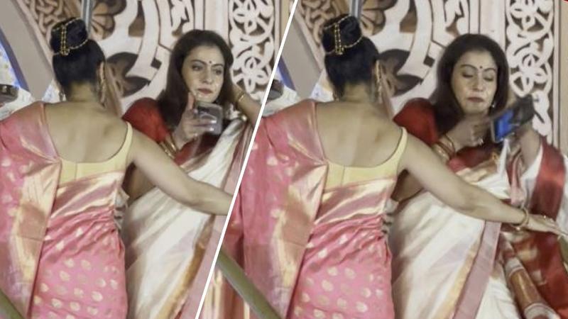 Kajol drops her phone at Durga Puja