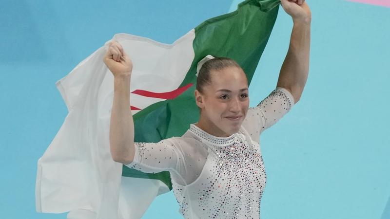 Kaylia Nemour of Algeria wins the gold in uneven bars and Suni Lee takes the bronze