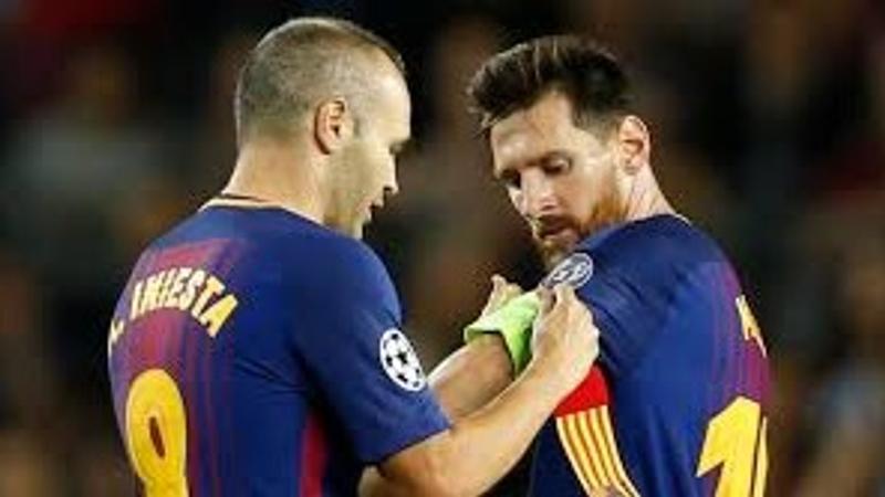 Lionel Messi and Andres Iniesta 