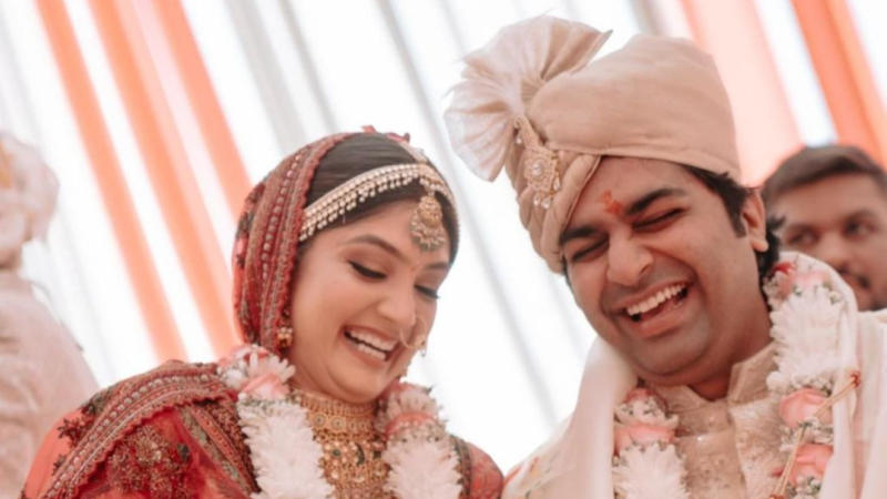 Malhar Thakar and Puja joshi at their wedding.