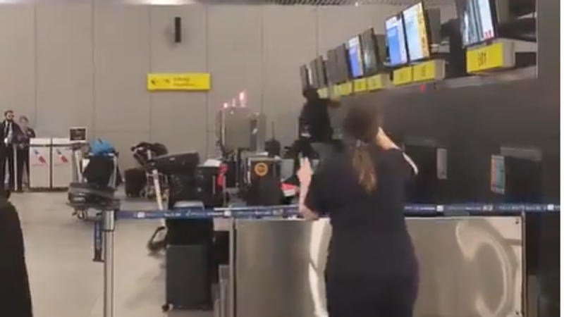 Man destroys American Airlines counter at Chile Airport.