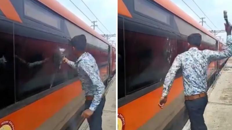 Man smashing the train window 