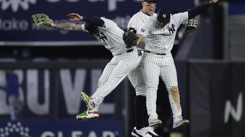 Mets and Yankees win playoff games on same day for first time