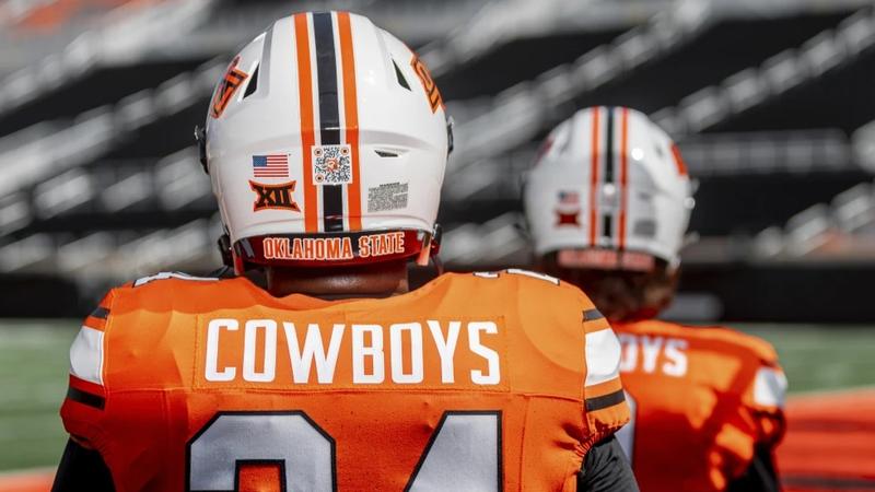 Oklahoma State Athletics shows a QR code on an Oklahoma State NCAA college football helmet