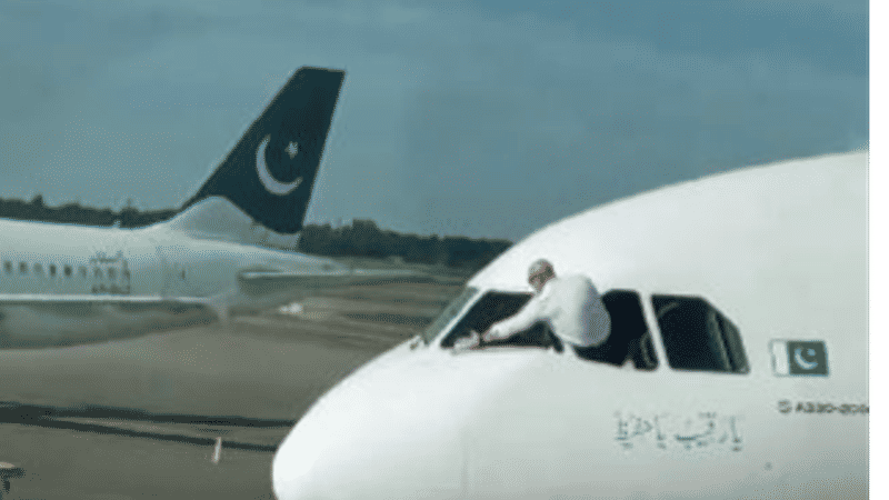 pakistani pilot cleaning plane window