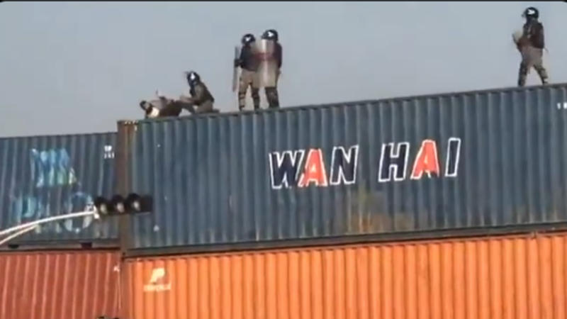 Pakistani security forces throw man from three-storey cargo containers while offering Namaz