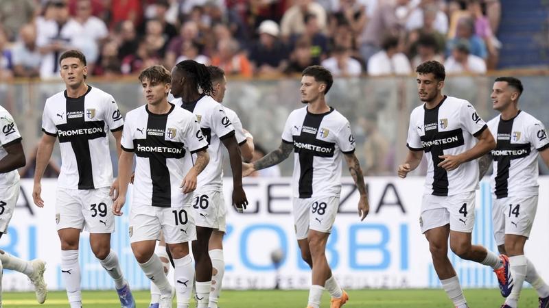 Parma players celebrate a goal