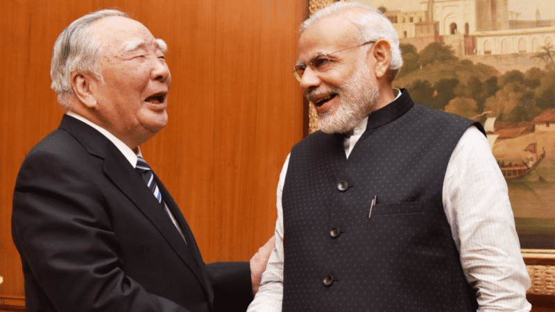 PM Modi & Osamu Suzuki