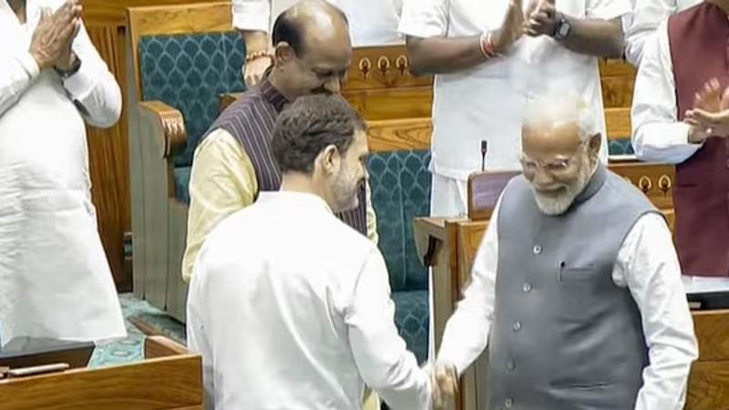 PM Modi, Rahul Gandhi shake hands in Lok Sabha