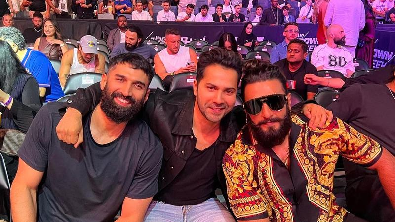 Ranveer Singh, Varun Dhawan and Aditya Roy Kapur at UFC event.