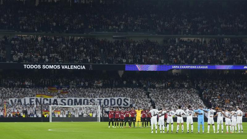 Real Madrid and AC Milan pay tribute to victims of deadly Valencia floods in Champions League match